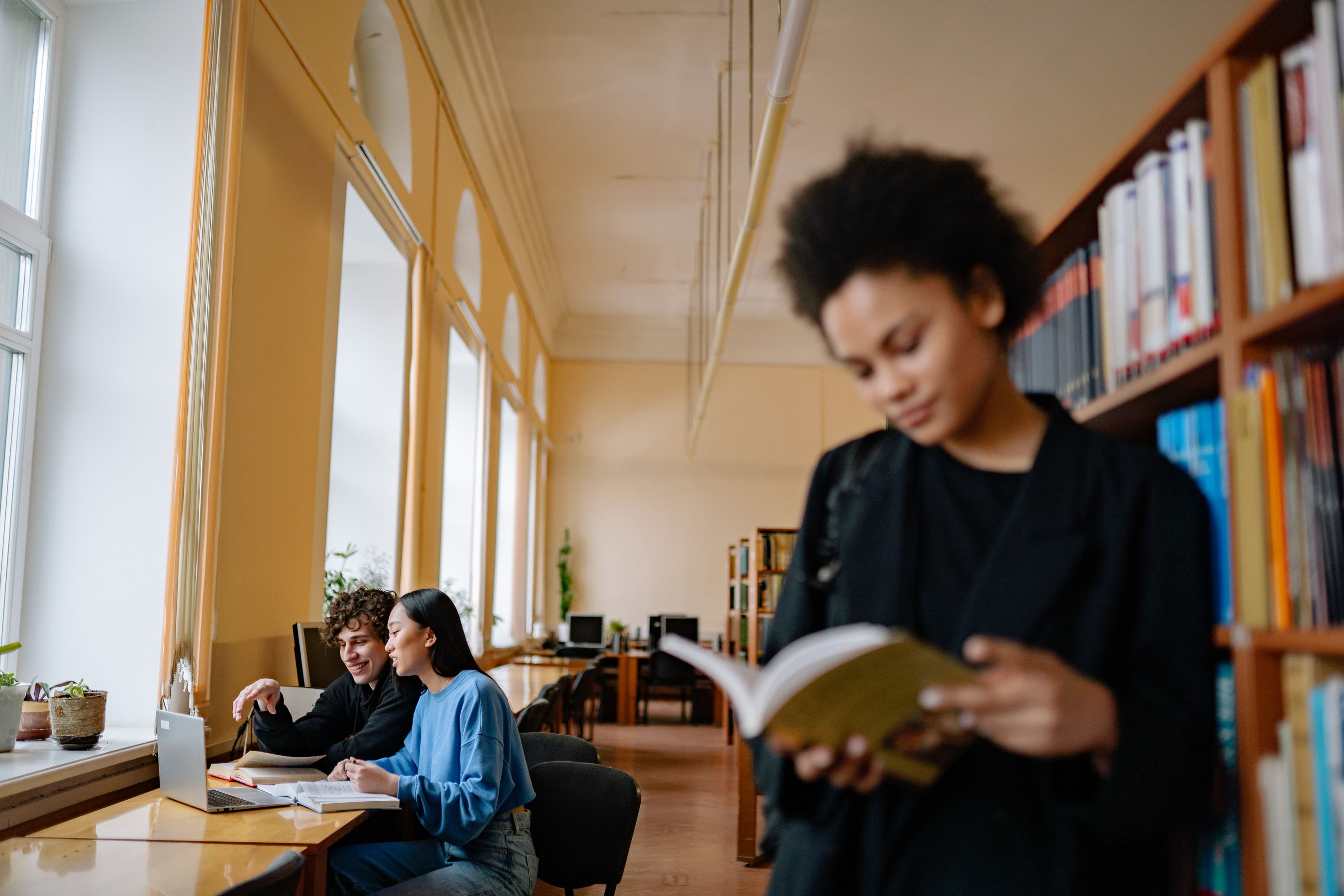 Students studying in a university library
