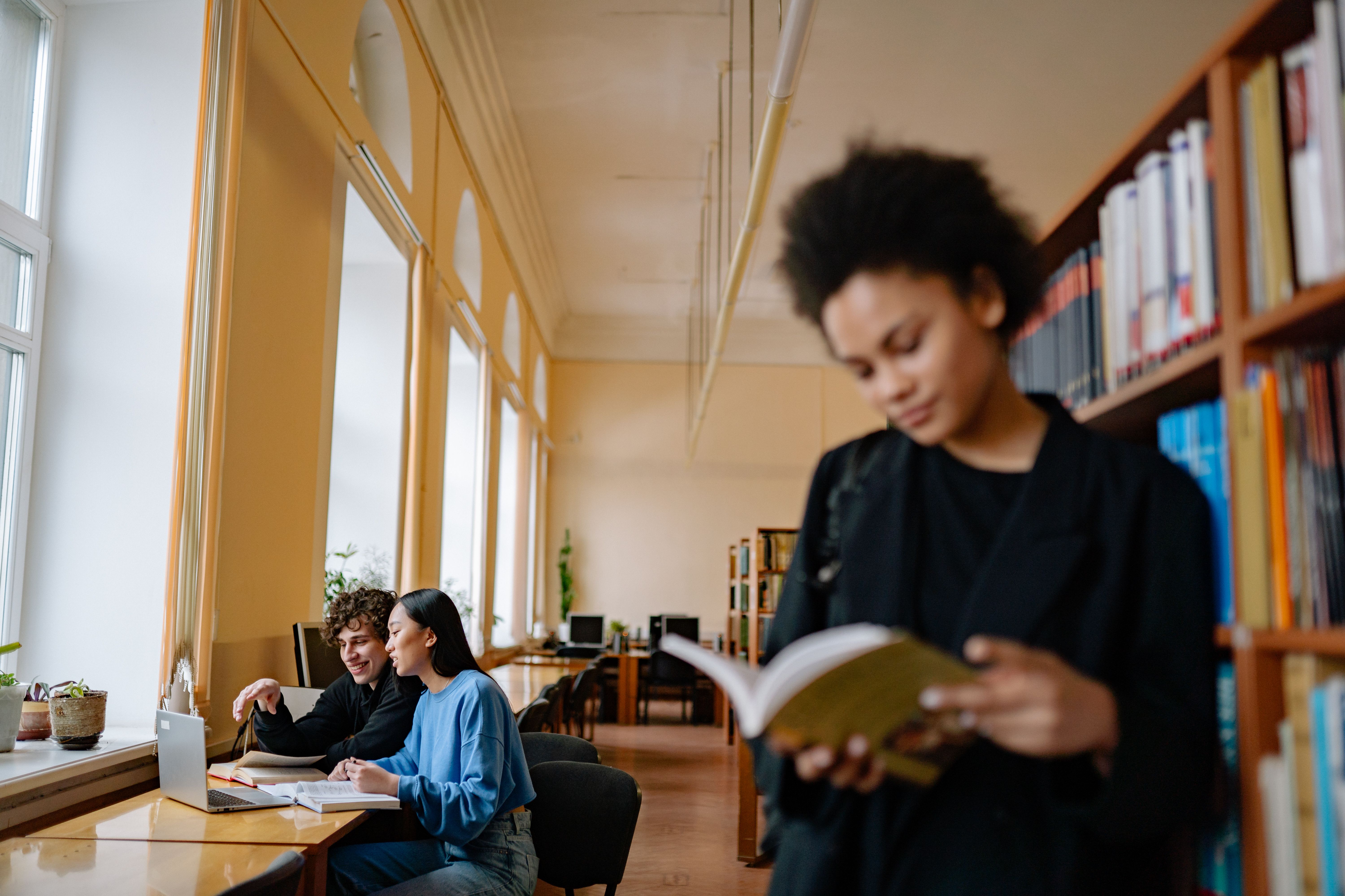Students studying in a university library